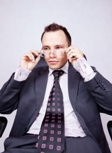 Young businessman with a pair of modern glasses